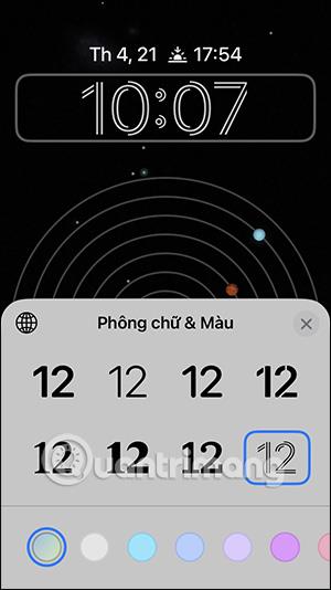 Інструкції щодо зміни стилю годинника на екрані блокування iPhone