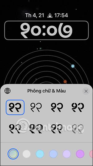 Інструкції щодо зміни стилю годинника на екрані блокування iPhone